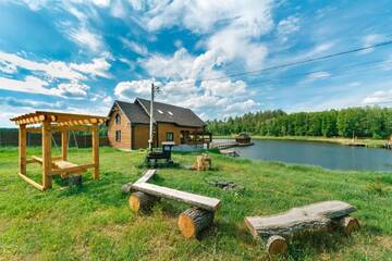 Фото Загородные дома GuestHouse on the Lake with Bathhouse 70 km from Kiev г. Makariv 4