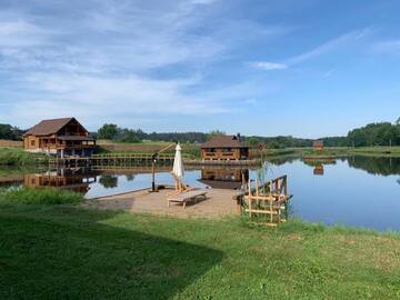 Фото Загородные дома GuestHouse on the Lake with Bathhouse 70 km from Kiev г. Makariv 1